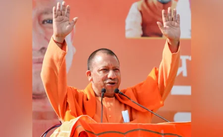Image showing Yogi Adityanath speaking at a political rally.