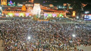 "Devotees waiting in line at Tirumala temple complex during a busy weekend."